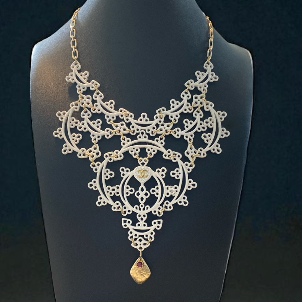 Jessica Simpson redesigned white bib necklace with gold hardware and pendant